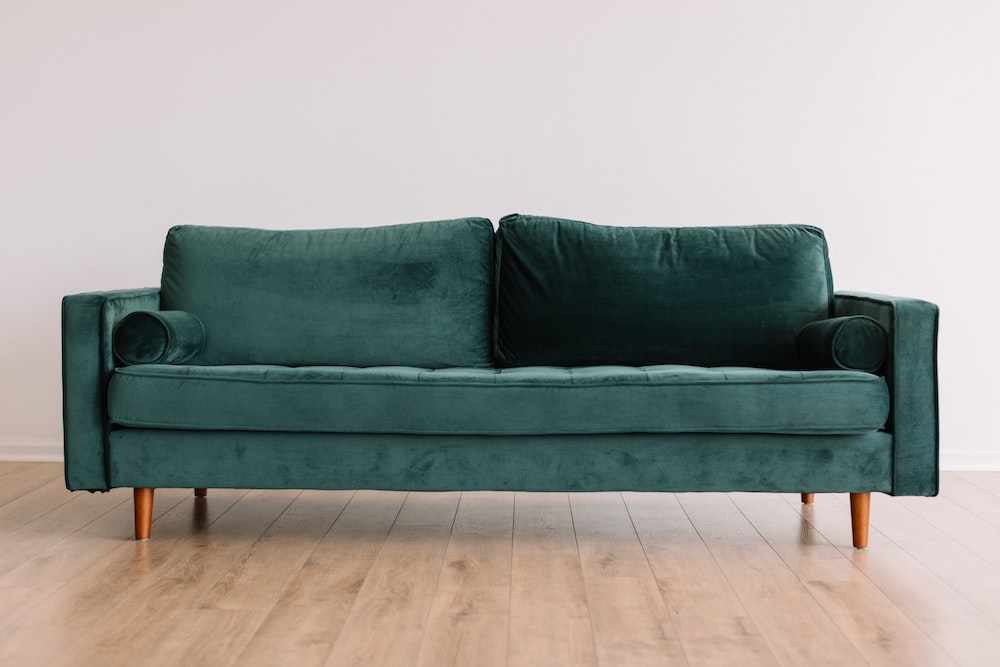 Green suede sofa